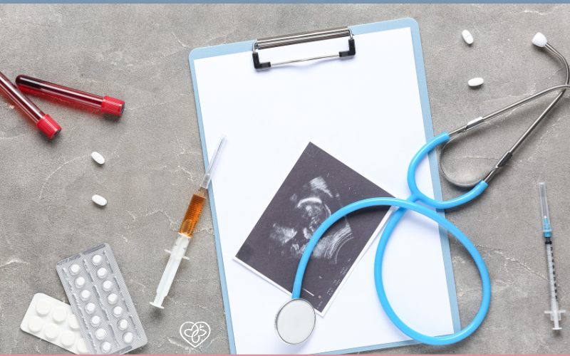 medical equipment, medication, and photo of a pregnancy ultrasound